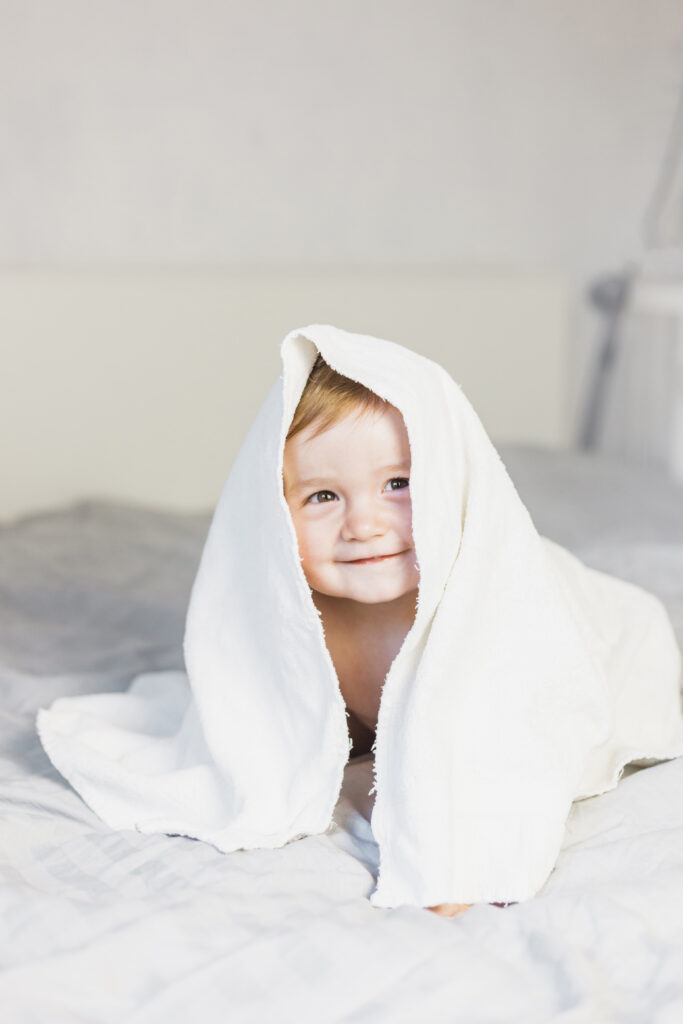 blonde baby with towel